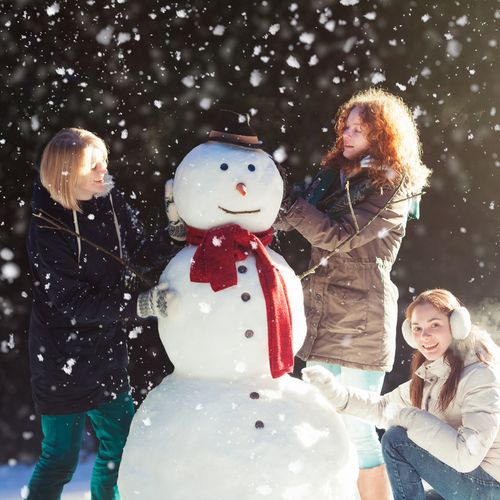 Family making Snowman